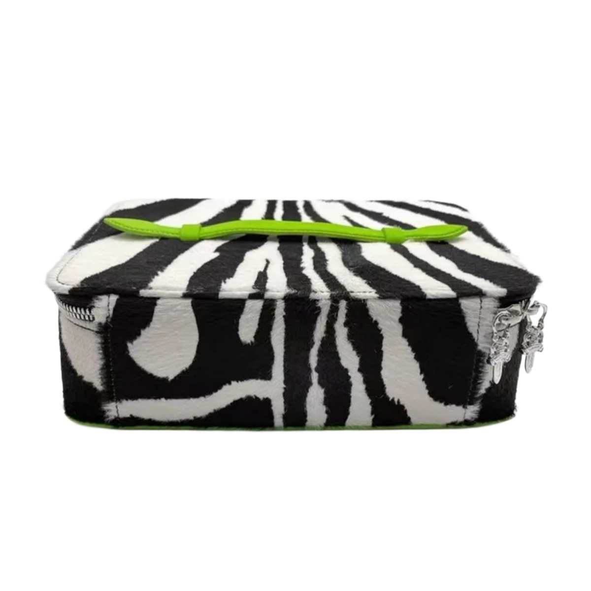 An angled side profile view of the closed 'Green Zebra' leather jewelry case resting flat, highlighting the seamless alignment of the vibrant neon green and black zebra pattern across the firm perimeter corners, clean black edge glazing, and a robust structural base build.