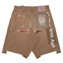 Back flat lay view of the faded brown Better With Age utility shorts, highlighting the relaxed seat construction with traditional patch pockets, contrast printed brand typography scaling vertically up the right side seam, and intentional distressing near the belt loops.