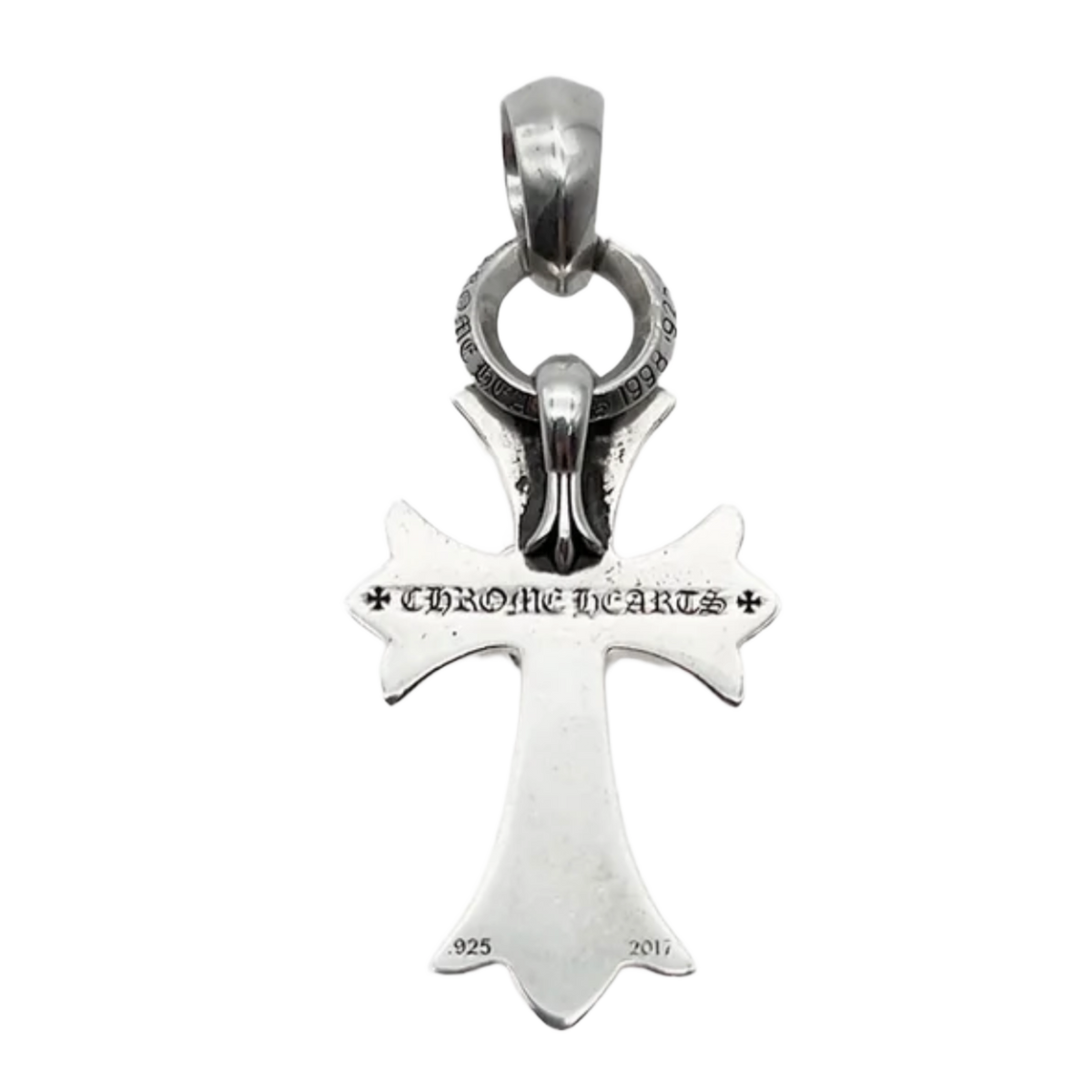 A straight-on view of the reverse side of the sterling silver pendant hanging suspended, highlighting the smooth, high-shine solid backing of the cross limbs, anchored by a prominent engraved signature gothic scroll banner across the horizontal crossbar reading 'CHROME HEARTS'.
