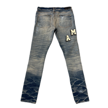 Amiri 'Varsity' Distressed Blue Jeans