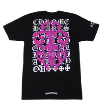 Back flat lay view of the black Chrome Hearts t-shirt, highlighting the relaxed streetwear drape, dominated by a large, vibrant multicolor graphic screen-printed across the center back torso depicting a stylized optician's eye chart with descending rows of neon pink, purple, and green gothic letters flanking a central white signature dagger design motif.