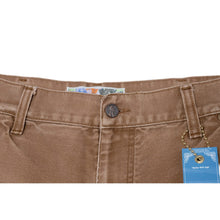A close-up horizontal shot focusing on the rear waistband panel, showcasing a classic multi-colored Better With Age branding patch sewn alongside a distressed pink logo label, highlighting the vintage leather and fiber card textures of the hardware.