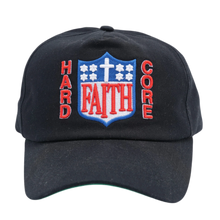 A straight front studio view of the Paly 'Hardcore Faith' hat, showcasing an unstructured six-panel vintage dad hat profile crafted from a premium washed black cotton twill canvas, featuring a curved stitched brim and a bold, dense graphic embroidery layout across the center front crown spelling out 'FAITH' in stylized blue block text flanked vertically by 'HARD' and 'CORE' lettering in red, all centered below a small white embroidered christian cross motif.