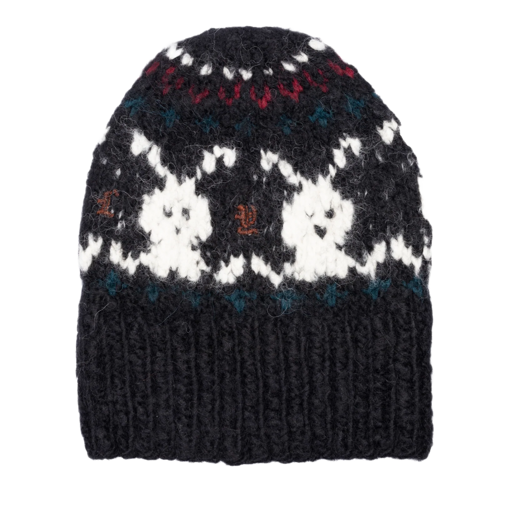 A clean profile layout view of the dark navy Paly hand-knitted beanie resting upright, highlighting the thick density of the chunky multi-colored knit yarn panels, the structural symmetry of the fold-over black ribbed cuff, and the snug watch-cap skull crown silhouette designed for a secure streetwear fit.