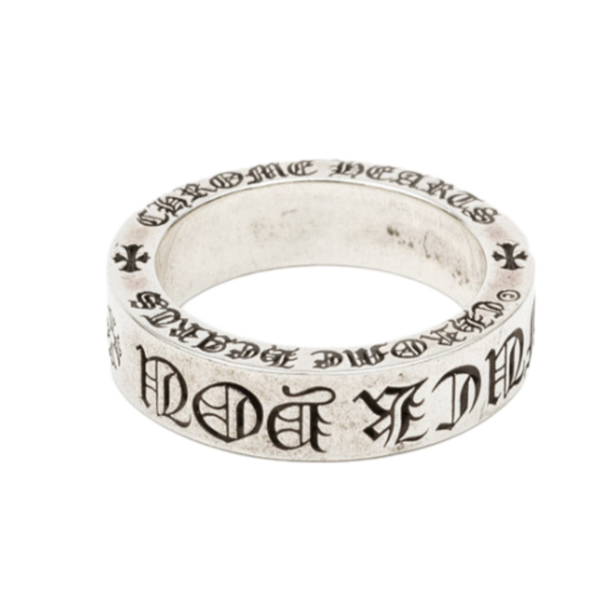 A three-quarter angled view of the polished sterling silver 6mm spacer ring resting flat, highlighting the reflective metal finish, the repeating engraved gothic text patterns around the perimeter, and the dark oxidized accents accentuating the lettering.