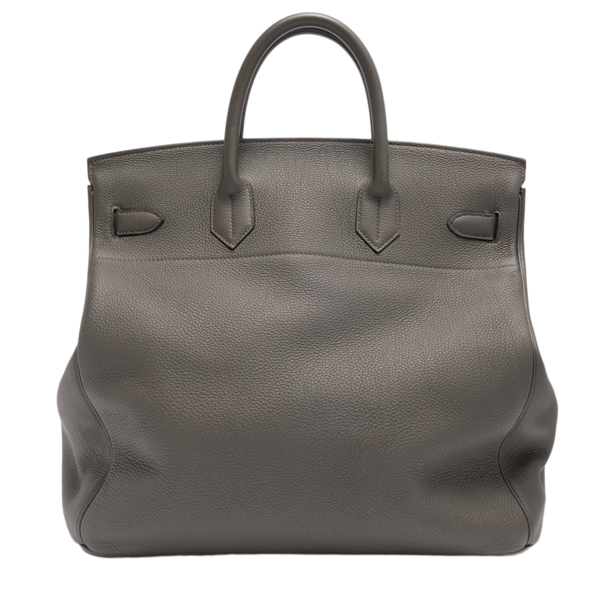Back view of the Hermès Birkin 40 travel bag in Etoupe Togo leather, emphasizing the sprawling, premium pebbled surface texture across the single-panel back construction and the precise, reinforced hand-stitching securing the bases of the rear leather handles.