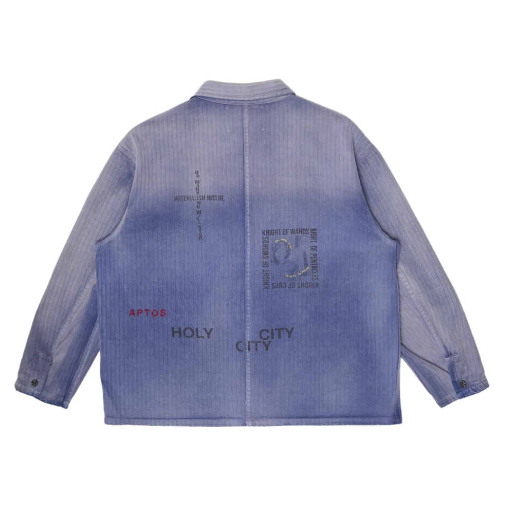 Back flat lay view of the Paly 'Holy City' Work Shirt, highlighting stenciled graphic text including 'APTOS', 'HOLY CITY', 'MATERIALISM MUST DIE', and tarot card names like 'KNIGHT OF WANDS'.