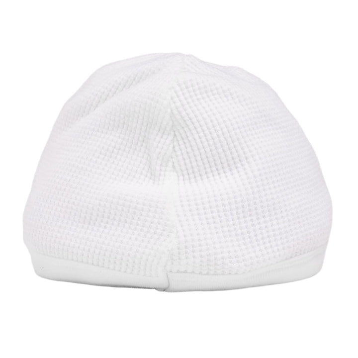 Back view of the white Chrome Hearts thermal skull cap, displaying a clean, unadorned solid white waffle-knit panels tapering up toward the top crown seam.
