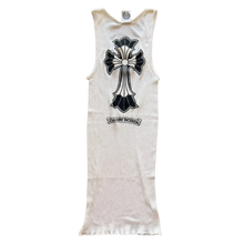 Back flat lay view of the white fine-ribbed vintage Chrome Hearts tank top, highlighting the classic racerback shoulder paneling and the elongated straight lower hem, dominated by a large, intricate black gothic cross graphic printed centered across the upper spine, complemented directly underneath by a signature black gothic scroll text logo.
