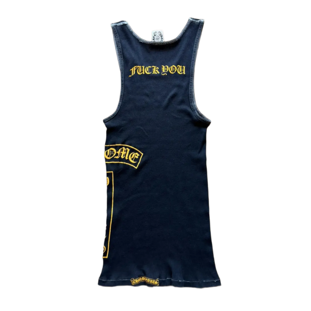 Back flat lay view of the navy blue vintage Chrome Hearts tank top, highlighting the classic racerback or T-bar shoulder construction that narrows elegantly across the upper spine, dominated by an arched bright yellow gothic script brand logo screen-printed cleanly across the shoulder blade panel.