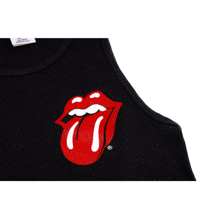 Macro detail of the front print, showcasing the vibrant red and white ink of the classic Rolling Stones tongue logo over the textured black ribbed cotton canvas.