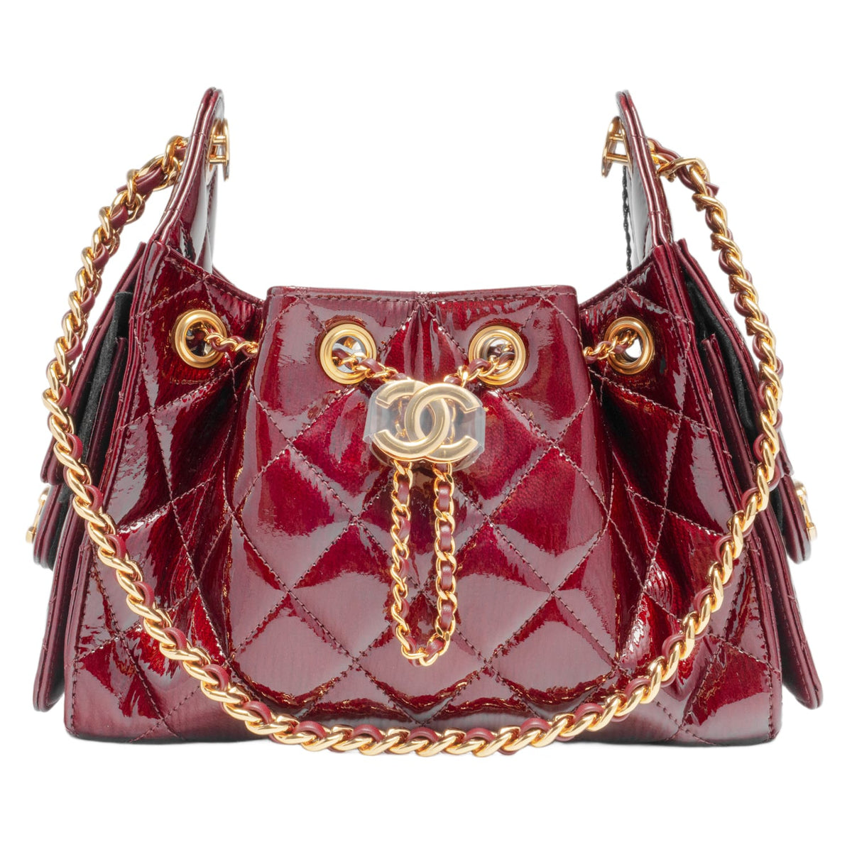 Front studio view of the Chanel Hobo 25 handbag, showcasing a structured slouchy silhouette crafted from a premium shiny calfskin leather in a rich dark burgundy hue, enveloped in classic diamond quilting patterns, detailed with dual interwoven gold-tone metal and leather shoulder straps, and a prominent oversized gold metal CC turn-lock emblem centered on the front face.