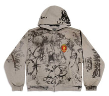 Front flat lay view of the Balenciaga 'Skater' full-zip hoodie in heavily washed grey fleece, featuring an exaggerated oversized silhouette, dropped shoulders, a silver front zipper, a split kangaroo pocket, and all-over distressed graffiti doodles, tags, and graphics detailing the torso, sleeves, and hood.