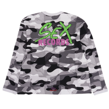 Back flat lay view of the grayscale camouflage Matty Boy thermal shirt, showcasing a large central graphic on the upper back featuring a vibrant neon green 'SEX RECORDS' text design surrounded by abstract pink hand-drawn monster eye illustrations.