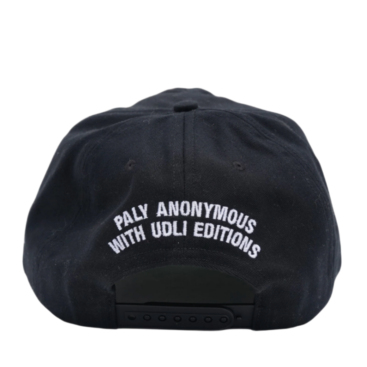 A straight-on rear view of the black Paly 'Hardcore Faith' canvas cap resting flat, highlighting the low-profile crown posture and uniform panels, featuring a adjustable fabric strap closure with a metallic slider buckle, accented cleanly by a curved white embroidered text graphic stitched across the rear opening arc.