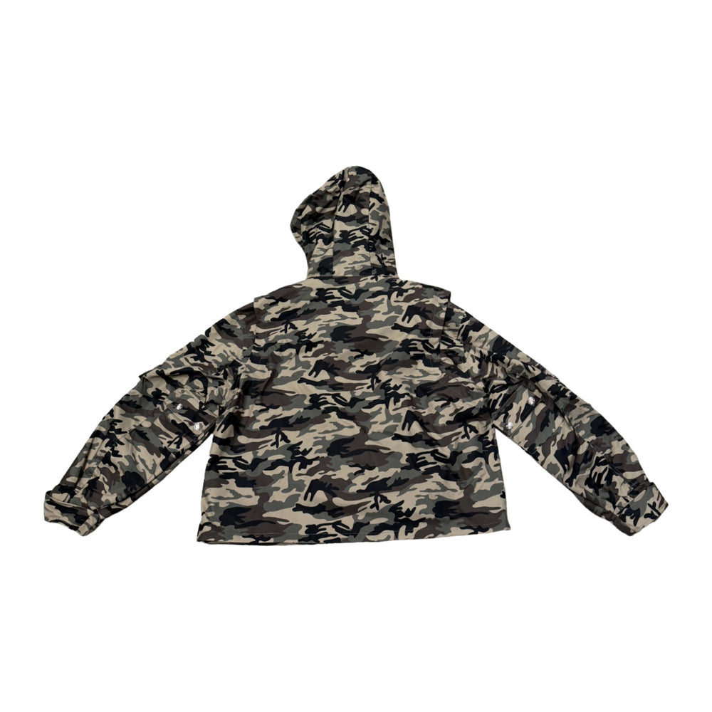 Back flat lay view of the Saint Vanity camouflage nylon outerwear jacket, highlighting the relaxed boxy streetwear drape and loose-fitting sleeves with a continuous, seamless woodland camo print texture wrapping from the structured hood down across the entire back panel.