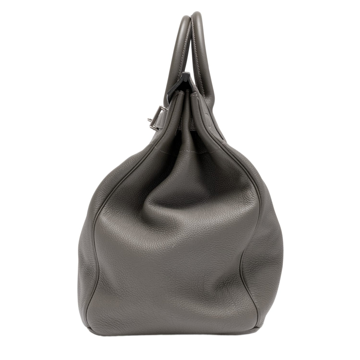 A left side profile view of the olive Etoupe Hermès Birkin 40 bag, showcasing the architectural expansion folds of the triangular leather side gusset, clean tonal resin edge glazing, and the flawless alignment of the thick structural perimeter stitching.