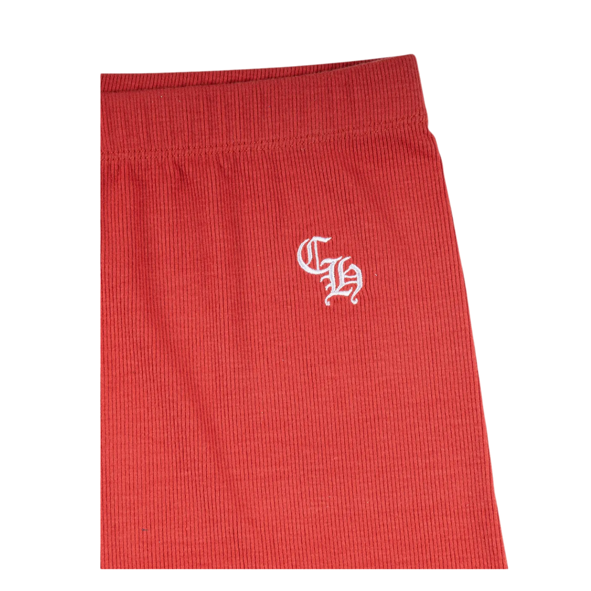 Back flat lay view of the red Chrome Hearts women's biker shorts, highlighting the sleek minimalist compression tailoring, an unadorned reverse panel layout that emphasizes the uniform performance textile drape, and clean structural flatlock edge stitching running across the secure lower thigh leg hems.