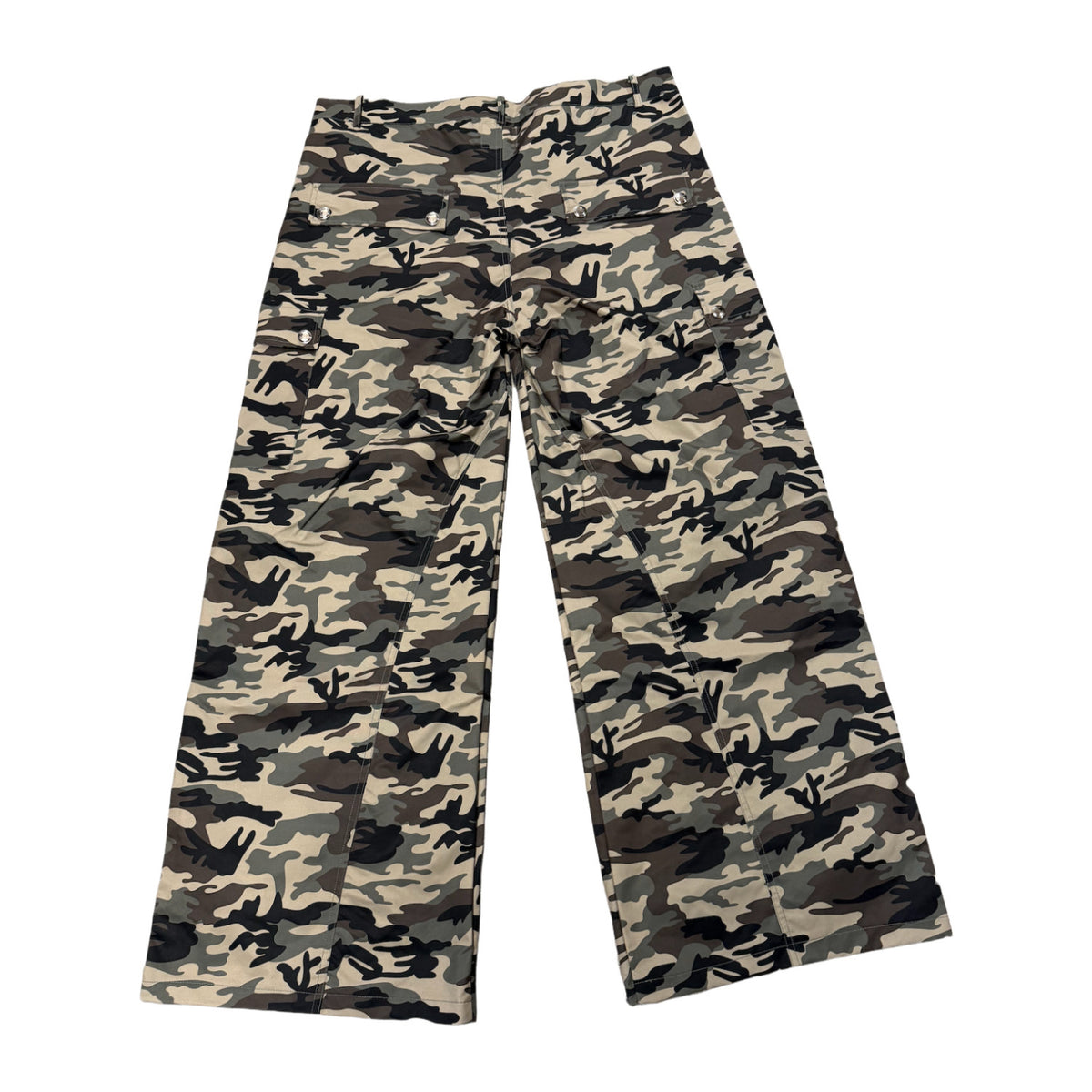 Back flat lay view of the Saint Vanity camouflage nylon cargo pants, highlighting the straight-cut athletic silhouette from the elastic waistband down to the open-hem cuffs, featuring a continuous woodland camo print texture across the back panels and sides.