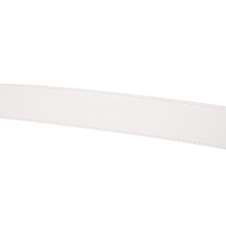 A flat horizontal view of the midsection of the white leather belt strap against a plain background, demonstrating the consistent width and clean, unembellished luxury leather grain.