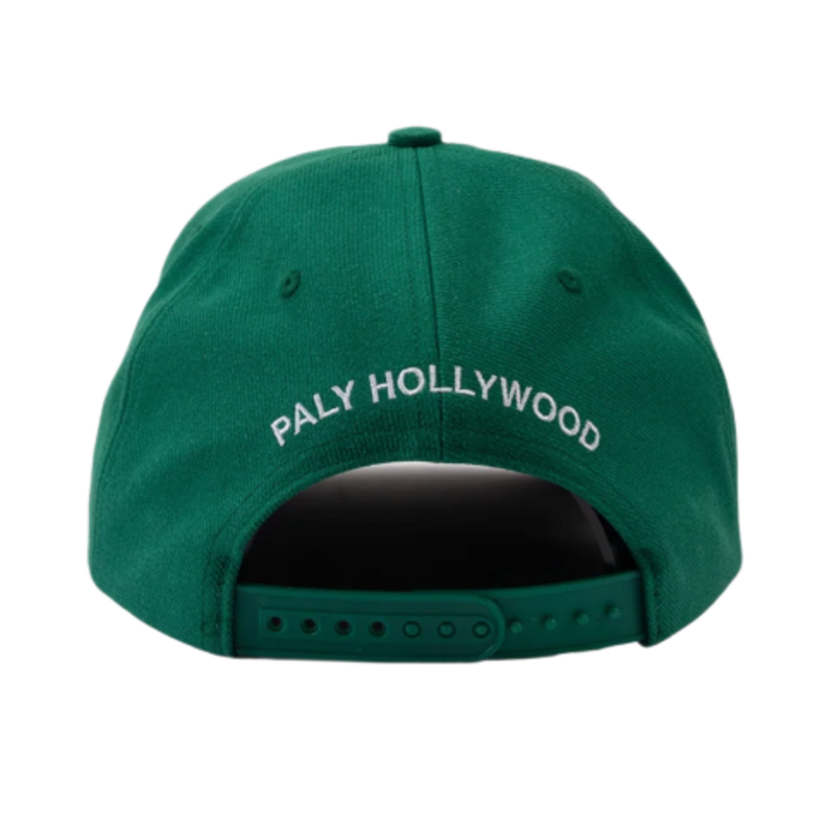 A straight-on rear view of the emerald green Paly twill cap resting flat, highlighting the curved crown architecture, tonal ventilation eyelets, and an adjustable green fabric strap closure with a metallic adjustment buckle, accented cleanly by arched white embroidered branding text reading 'PALY HOLLYWOOD' stitched across the rear panel section.