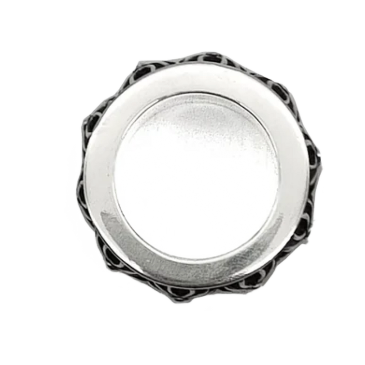 An angled top-down view focusing on the smooth, polished interior of the ring band, displaying the clean structural core lining and the dark, intricate border detailing where the spinner track connects.