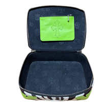 An elevated looking-down view of the fully opened Chrome Hearts jewelry case, showcasing a deep, luxurious navy blue soft suede interior lining divided into custom storage compartments, a dedicated ring roll section, a flat elasticated pocket under the lid, and a pop of neon green leather framing the interior perimeter walls.