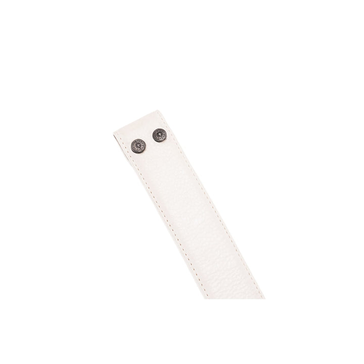 An angled view of the belt strap's buckle fold from the back, showcasing the clean edge paint, uniform tonal perimeter stitching, and the open snaps ready to house a custom belt buckle.